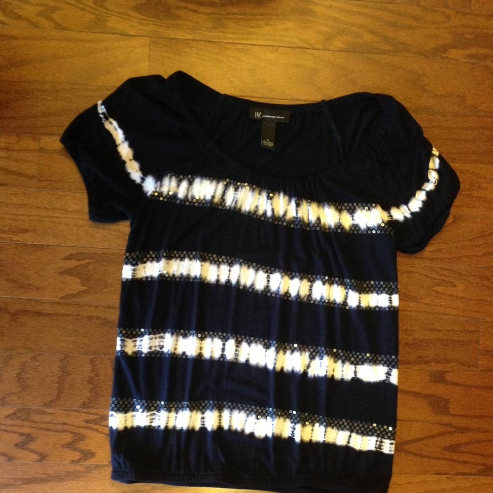 I-N-C blouse in black with white detail.